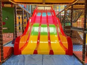 Multicoloured slide inside treasure island