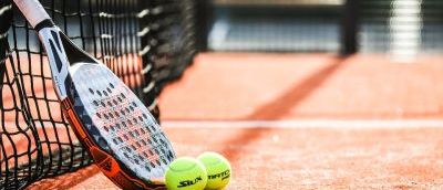 Tennis Racket with two tennis balls